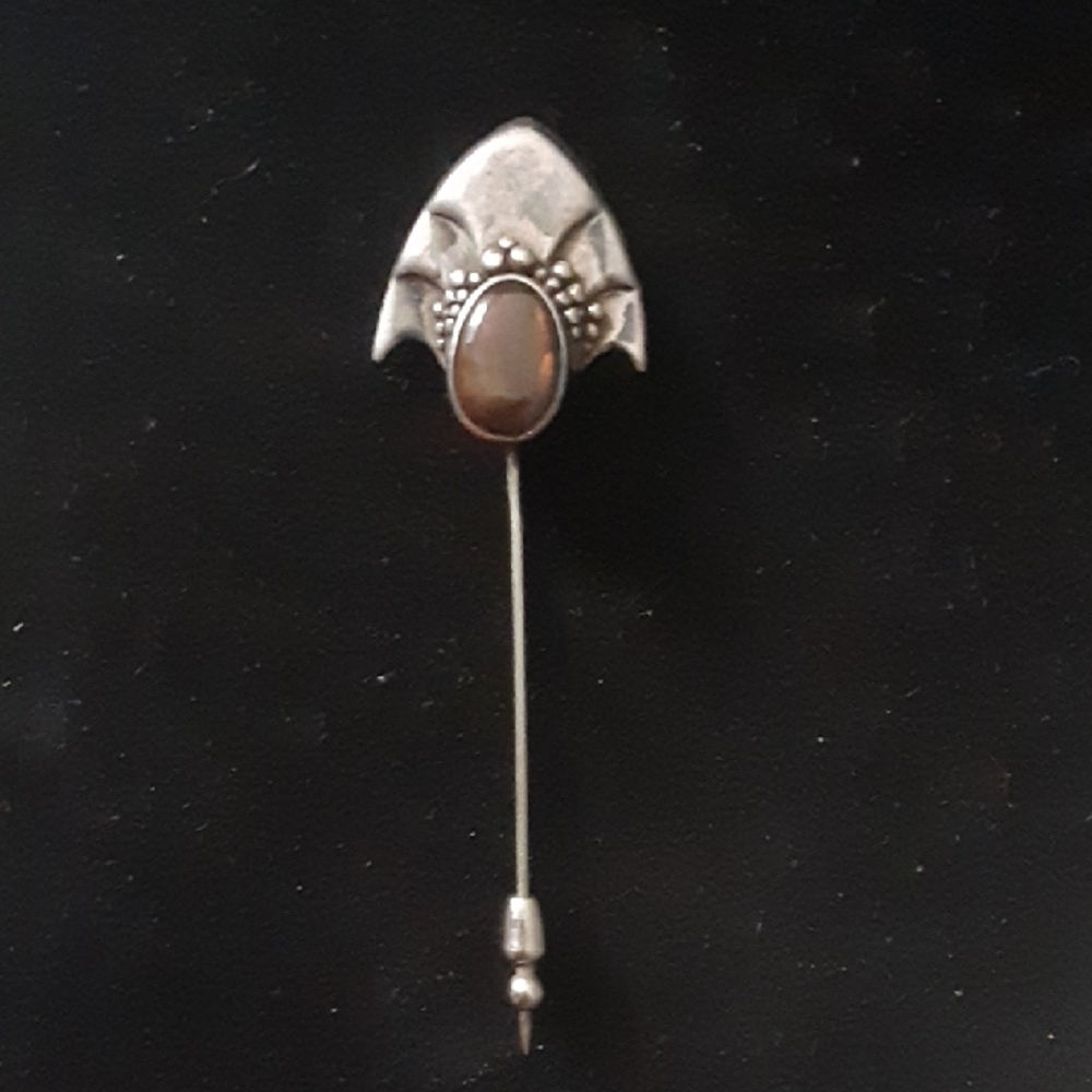 Elegant Silver and Brown Brooch